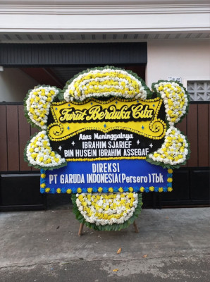 Papan Bunga Duka di Musaik