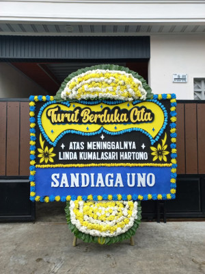 Papan Bunga Duka di Musaik